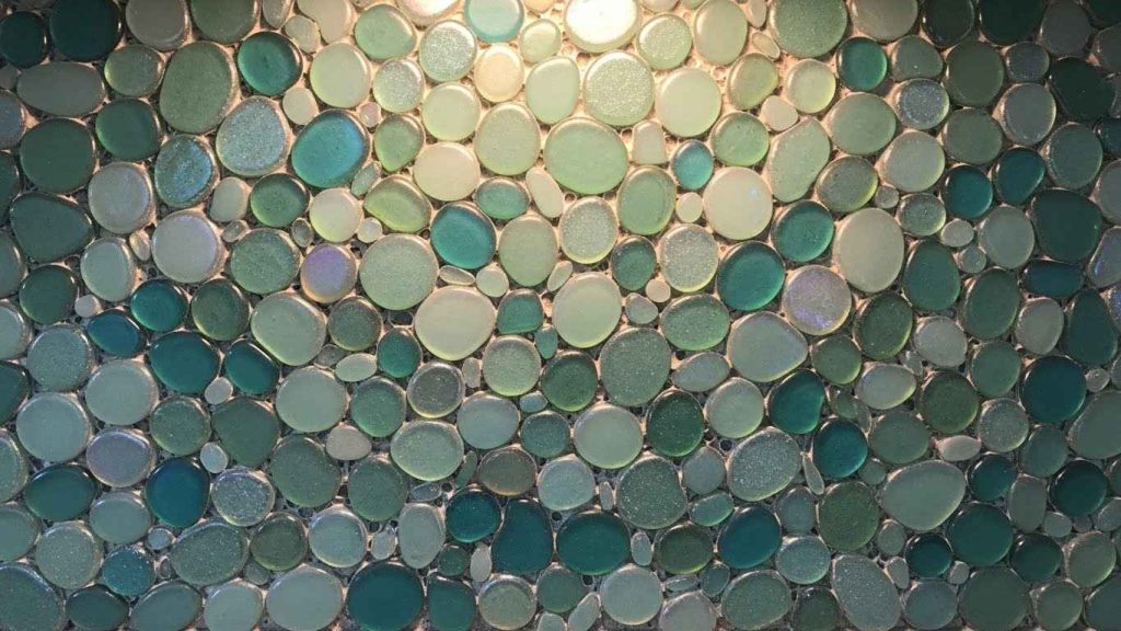 A Backsplash of Mosaic Glass Pebbles