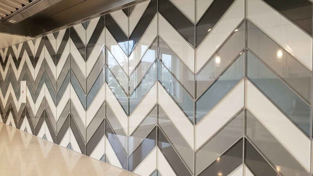A Bold Chevron Mosaic Glass Backsplash
