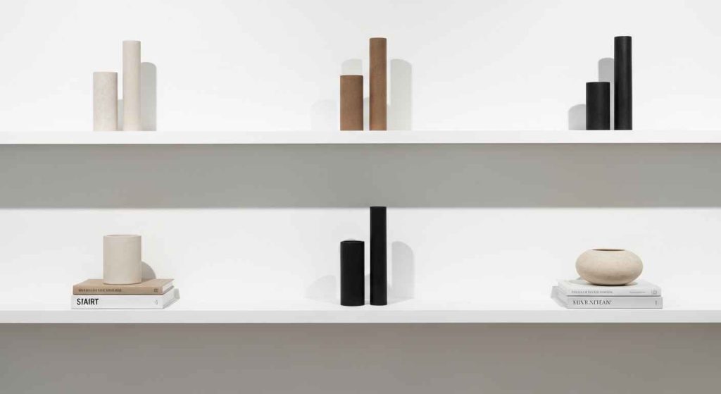 Curated Displays on White Kitchen Shelves