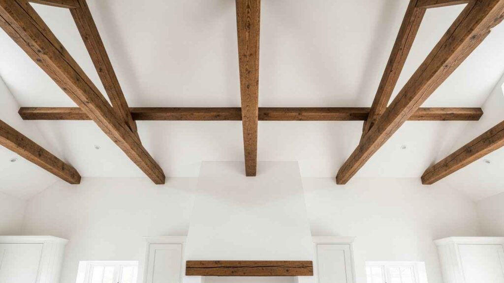 Exposed Wooden Beams on a White Ceiling