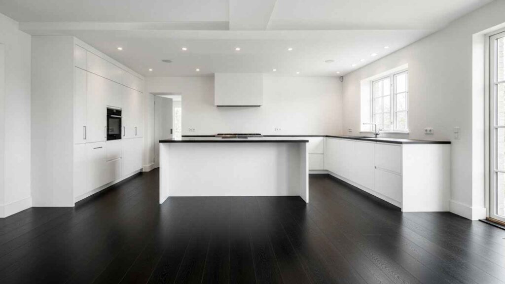 White Kitchen with Dramatic Dark Floors