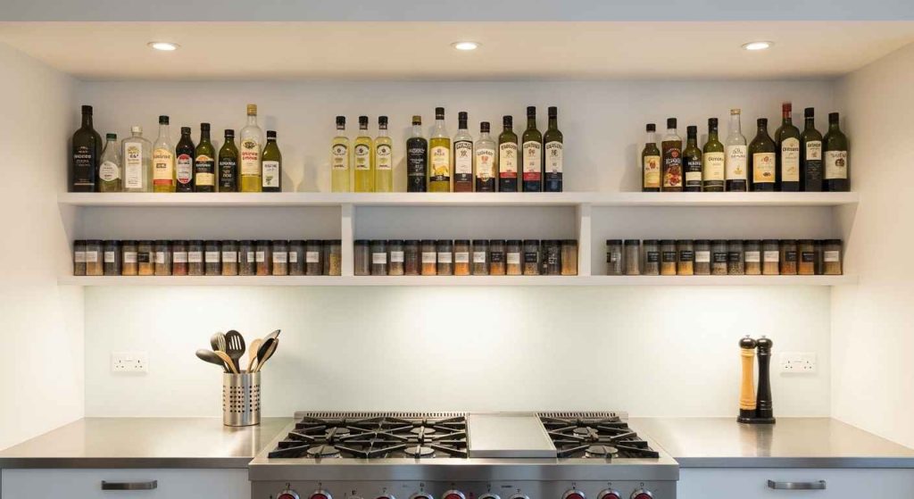 White Open Shelving Above the Stove